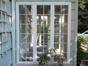 Window on the right side of the porch.  This is the new, low-e replacement window.